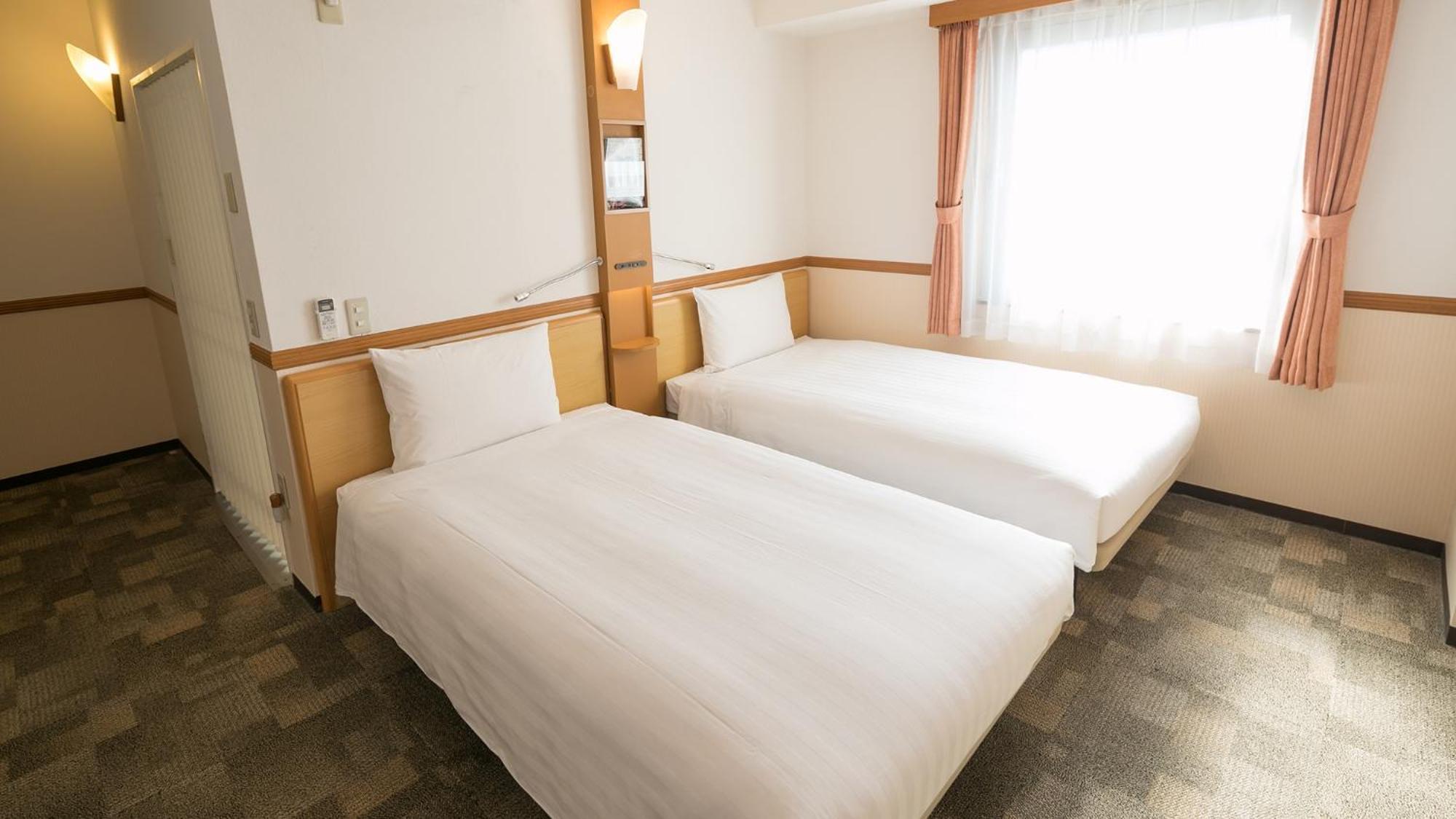 Toyoko Inn Takamatsu Hyogomachi Zimmer foto